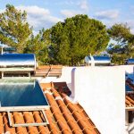 chairs-by-swimming-pool-against-sky-sunny-day-scaled-1.jpg