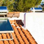 chairs-by-swimming-pool-against-sky-sunny-day-scaled-1.jpg